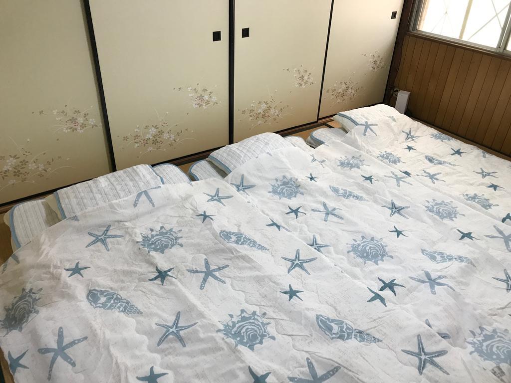 Guest House Okiniⅱ โอซาก้า ภายนอก รูปภาพ