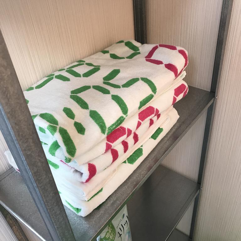 Guest House Okiniⅱ โอซาก้า ภายนอก รูปภาพ